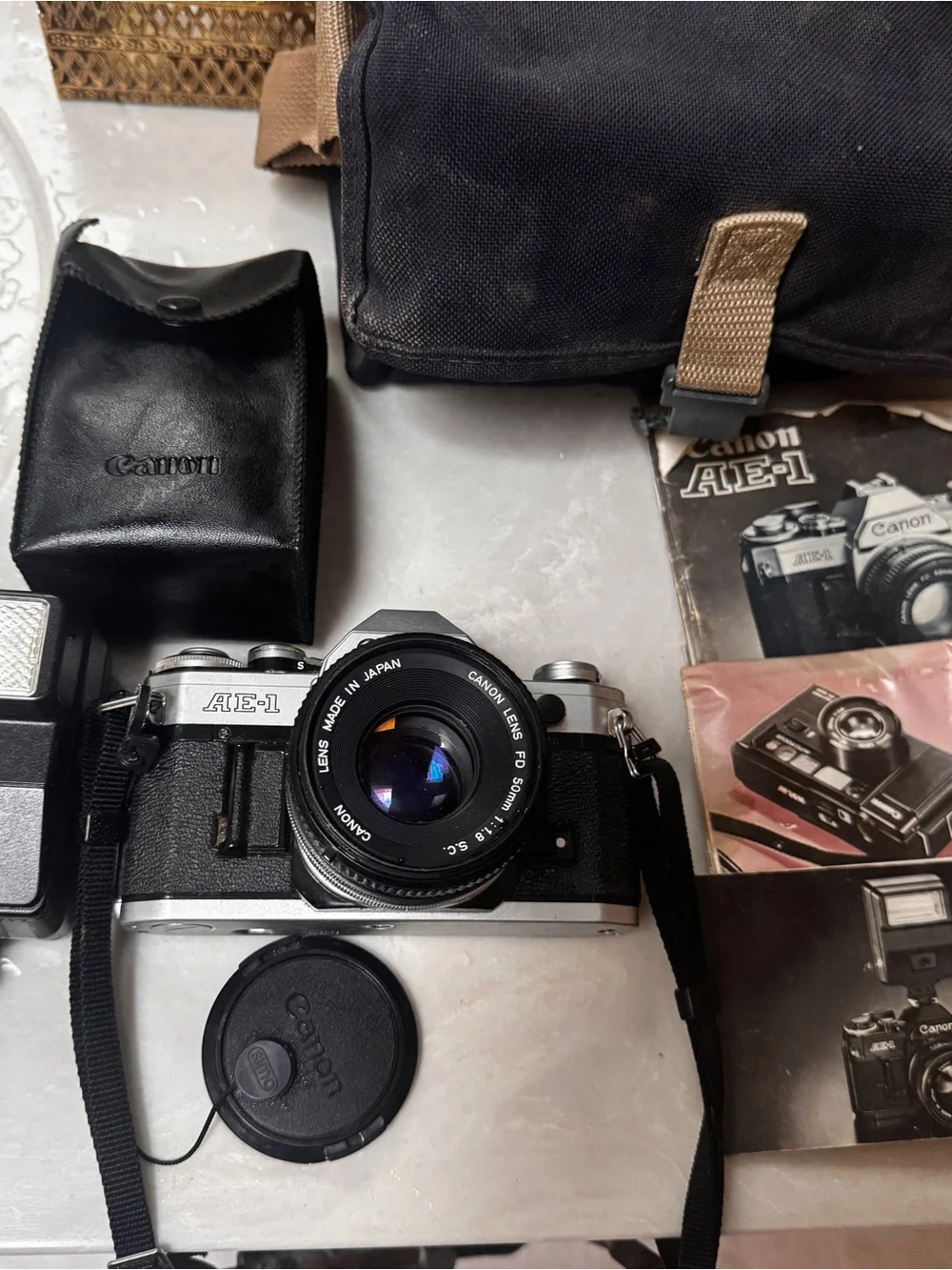 Canon AE-1 35mm Film Camera in Black and Silver with 50mm Lens with Flash